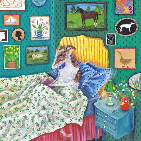 Art Greeting Card by E C Woodard, oil on canvas. A dog sitting up in bed reading a book.