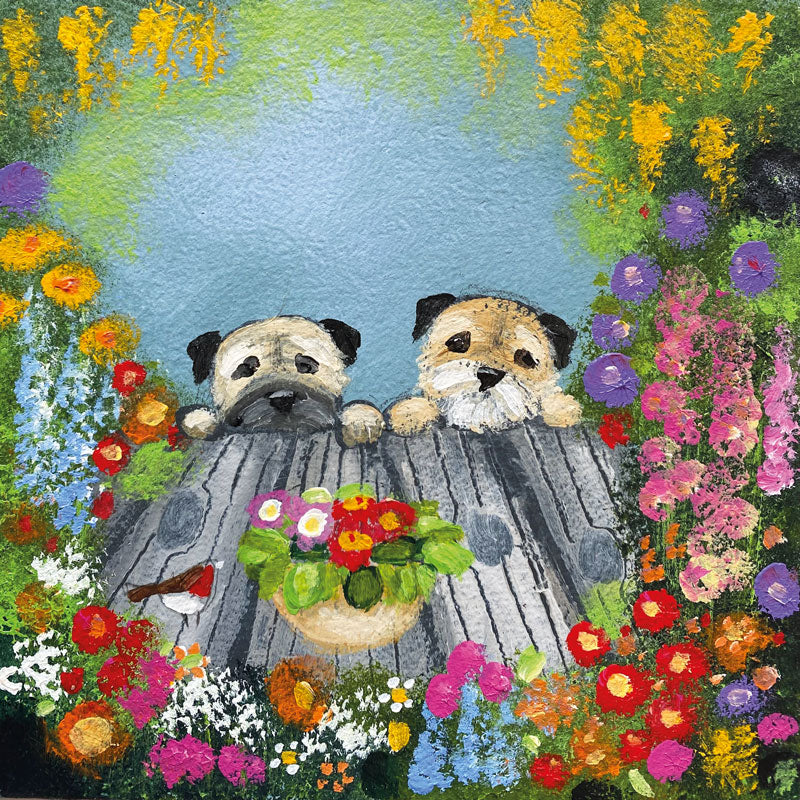 Art greeting card by Louise Rawlings, acrylic on canvas. Two Border Terriers peeping over a table surrounded by flowers and a Robin.